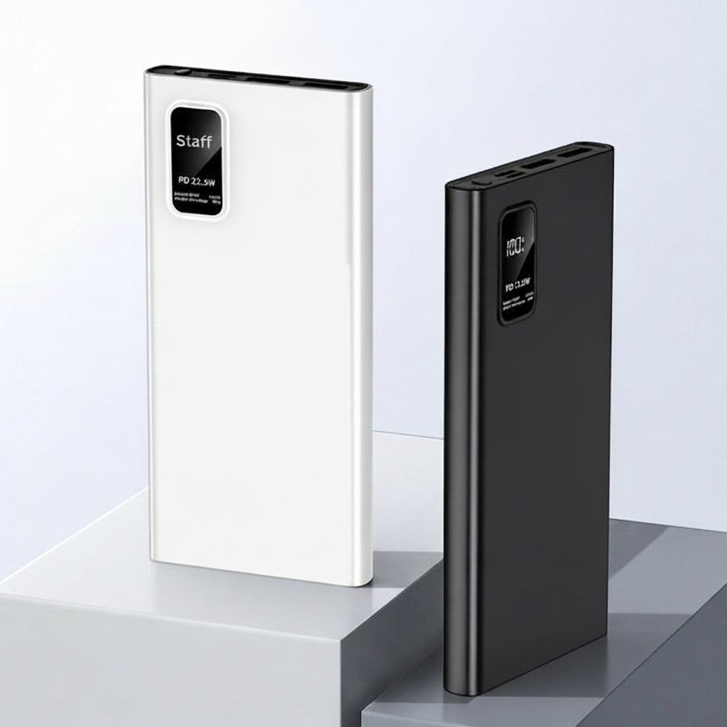 Two power banks, one white and one black, on a light gray surface with a white background.